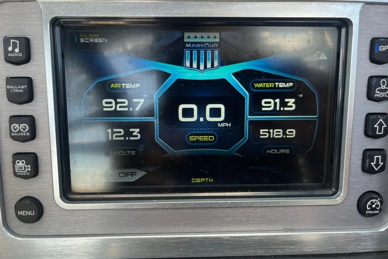 Slide: The Image of Dashboard of a 2017 MasterCraft X23 boat showing air and water temperatures. - 7