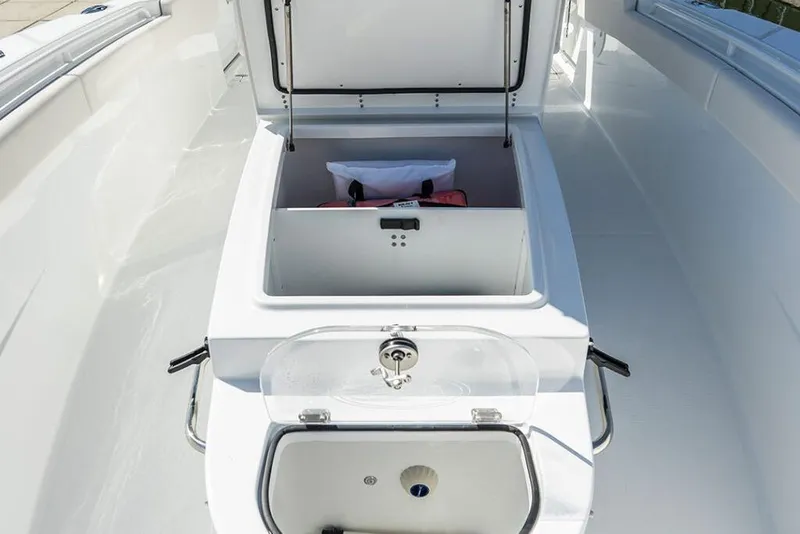 Slide: The Image of 2026 Sea Hunt Gamefish 28 Coffin Box interior, showcasing storage and sleek design. - 11