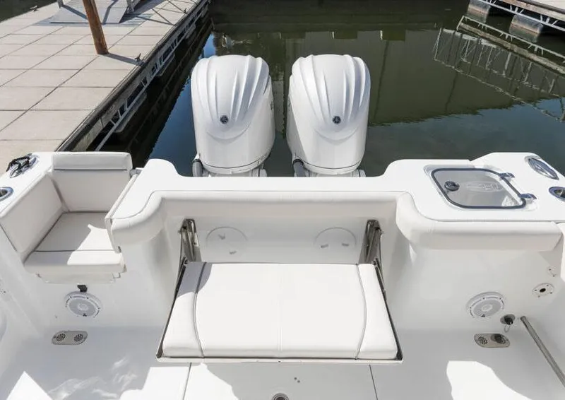 Slide: The Image of Manufacturer Provided Image: 2026 Sea Hunt Gamefish 28 Coffin Box boat with dual engines at dock. - 6