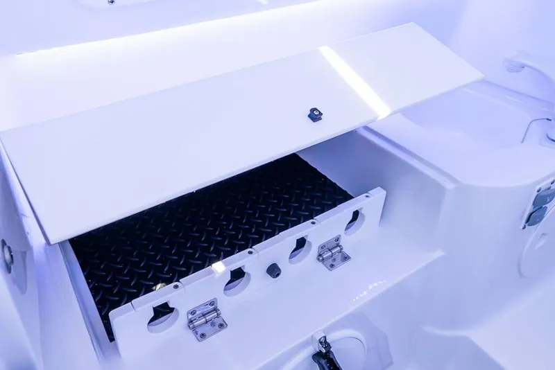 Slide: The Image of 2026 Sea Hunt Gamefish 28 Coffin Box interior with storage compartment and sleek design. - 9