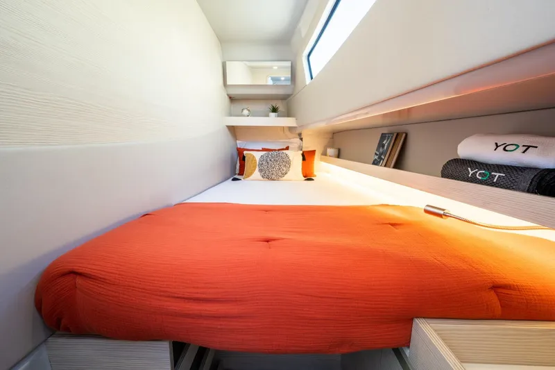 Slide: The Image of Luxurious cabin interior of 2026 YOT 36 yacht with modern bedding and decor. - 16