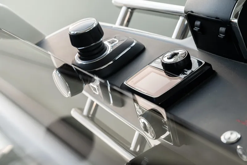 Slide: The Image of Control panel of a 2026 YOT 36 boat, featuring modern navigation equipment. - 9