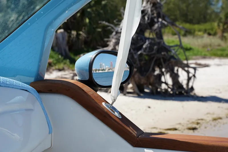 Slide: The Image of Side view of 2025 Car Off-shore Fiat 500 Classic on a sandy beach. - 12