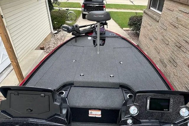 Slide: The Image of 2023 Nitro Z18 Pro fishing boat with spacious deck and advanced controls. - 10