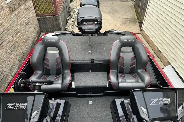 Slide: The Image of 2023 Nitro Z18 Pro boat interior with dual seats and steering console. - 7