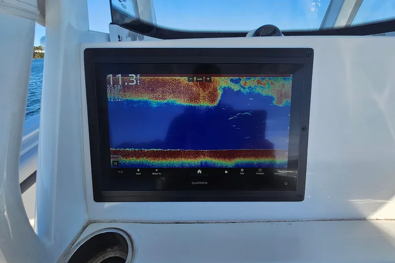 Slide: The Image of Fishfinder display on 2018 Tidewater 280 CC Adventure boat, showing underwater details. - 29