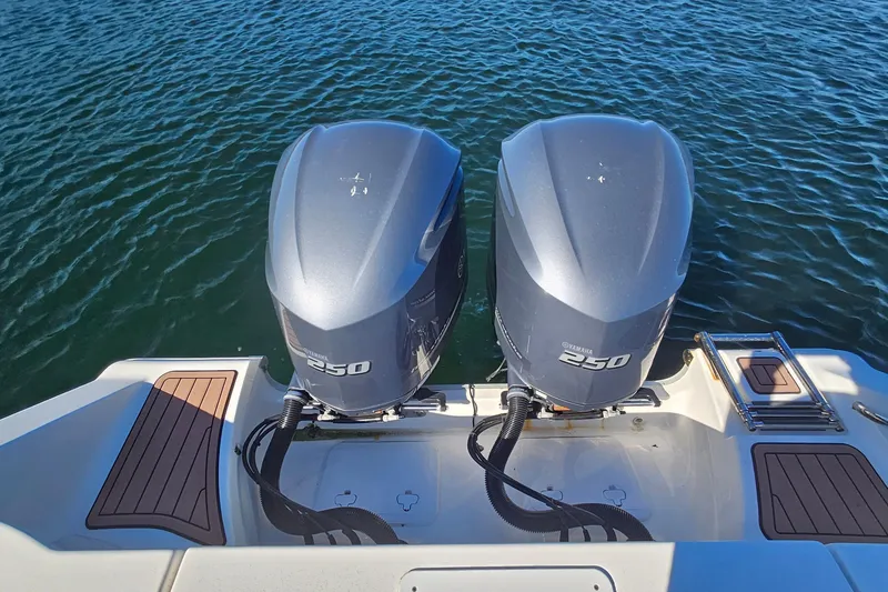 Slide: The Image of 2018 Tidewater 280 CC Adventure with twin Yamaha 250 engines on water. - 42
