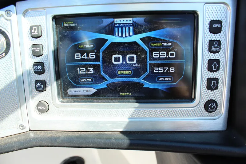 Slide: The Image of Dashboard display of a 2016 MasterCraft X26 boat showing temperature and speed metrics. - 20
