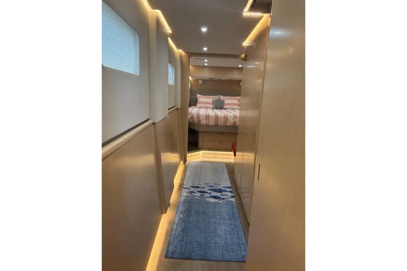 Slide: The Image of Luxurious interior of 2022 Seawind 1600 yacht with cozy bedroom and modern lighting. - 16