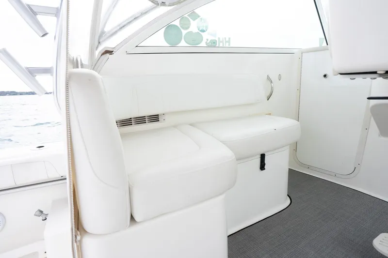 Slide: The Image of 2017 World Cat 320 EC interior with white seating and modern design. - 22