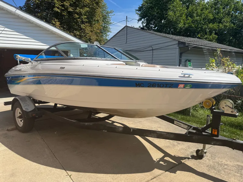 The Image of 2008 Four Winns 180 Horizon boat on trailer, parked in driveway. - 0