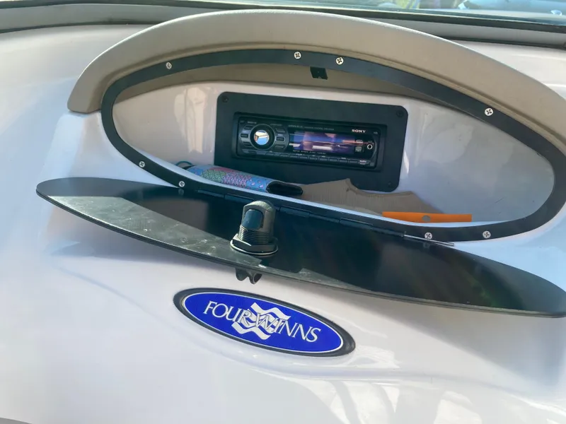 Slide: The Image of 2008 Four Winns 180 Horizon dashboard with Sony stereo system. - 16