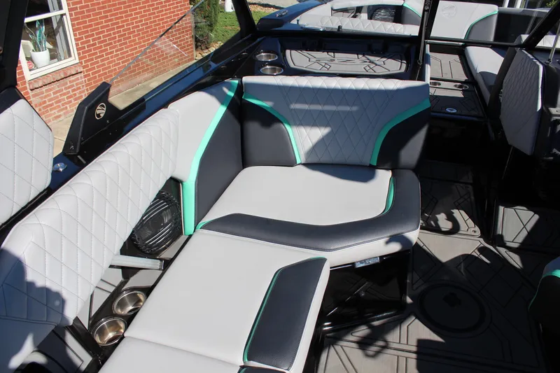 Slide: The Image of 2023 Tigé 24RZX boat interior with stylish seating and modern design. - 12