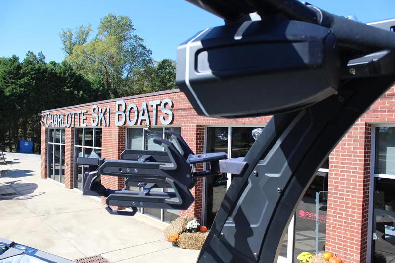 Slide: The Image of 2023 Tigé 24RZX boat at Charlotte Ski Boats dealership, sunny day. - 16