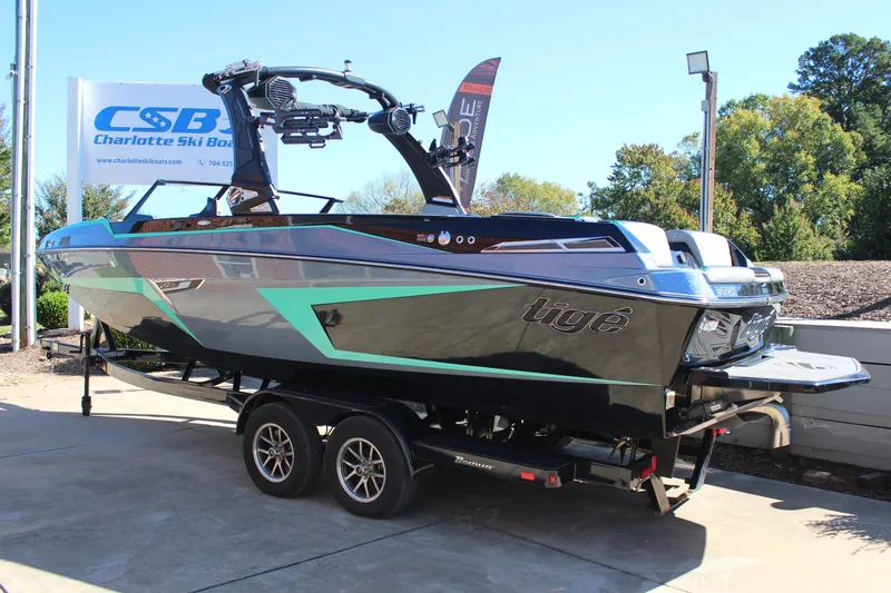 Slide: The Image of 2023 Tigé 24RZX boat on trailer at Charlotte Ski Boats dealership. - 3