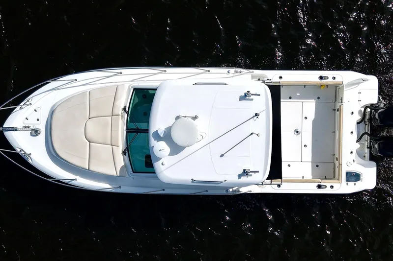 Slide: The Image of Overhead view of 2015 Boston Whaler 315 Conquest boat on dark water. - 47
