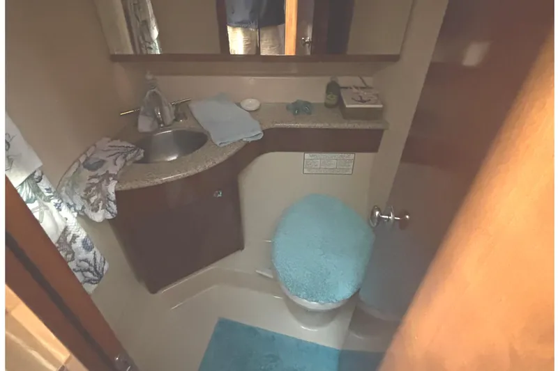 Slide: The Image of Bathroom interior of 2007 Meridian 391 Sedan yacht with sink and toilet. - 7