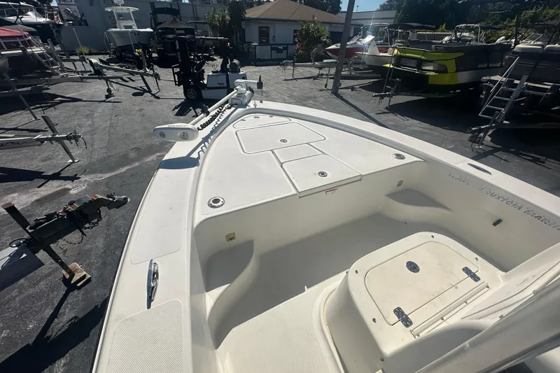 Slide: The Image of 2003 Hydra-Sports 19 Bay Bolt boat interior, showcasing spacious deck and storage compartments. - 10