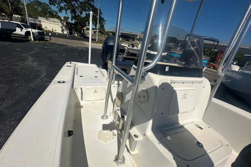 Slide: The Image of 2003 Hydra-Sports 19 Bay Bolt boat interior with console and seating area. - 14