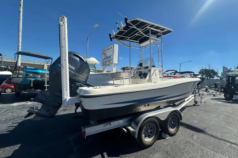 Slide: The Image of 2003 Hydra-Sports 19 Bay Bolt boat on trailer, featuring Yamaha outboard motor. - 2