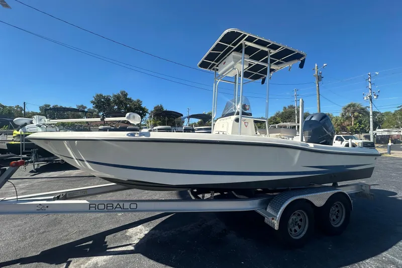 Slide: The Image of 2003 Hydra-Sports 19 Bay Bolt boat on Robalo trailer, parked outdoors. - 8