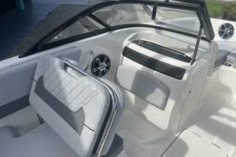 Slide: The Image of 2023 Bayliner VR5 Bowrider OB interior with modern seating and dashboard design. - 11