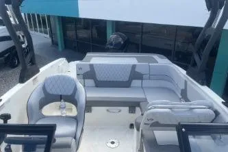 Slide: The Image of 2023 Bayliner VR5 Bowrider OB with modern seating and sleek design. - 14