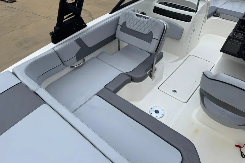 Slide: The Image of 2023 Bayliner VR5 Bowrider OB interior with gray seating and modern design. - 16