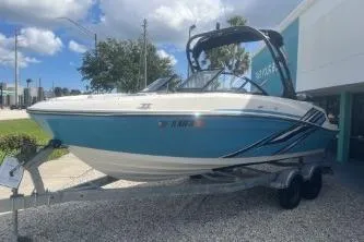 Slide: The Image of 2023 Bayliner VR5 Bowrider OB on trailer outside Boateka dealership. - 3