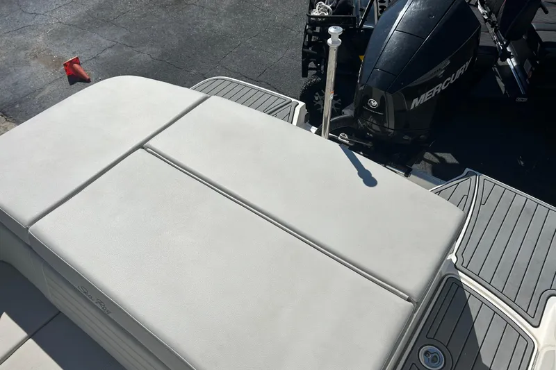 Slide: The Image of 2020 Sea Ray SPX 230 Outboard boat with Mercury engine, featuring cushioned seating and deck. - 17