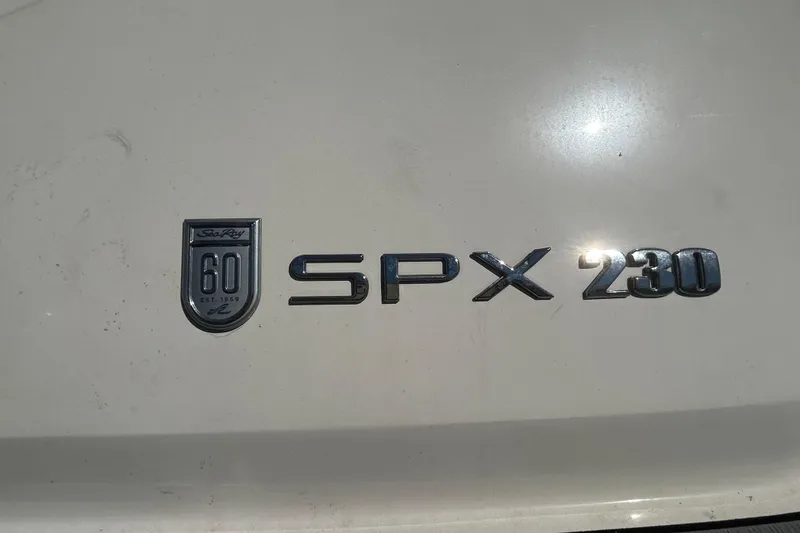 Slide: The Image of Sea Ray SPX 230 Outboard 2020 emblem on boat exterior. - 5