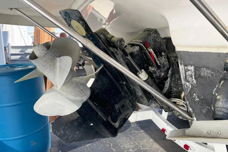 Slide: The Image of Close-up of a 2004 Regal Commodore 2665 boat propeller and engine components. - 6