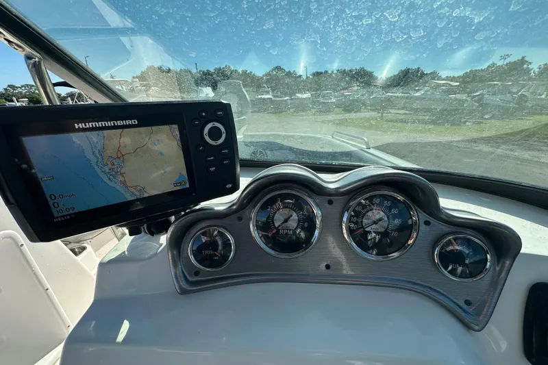 Slide: The Image of Dashboard of 2021 NauticStar 203 DC with Humminbird GPS and gauges. - 30