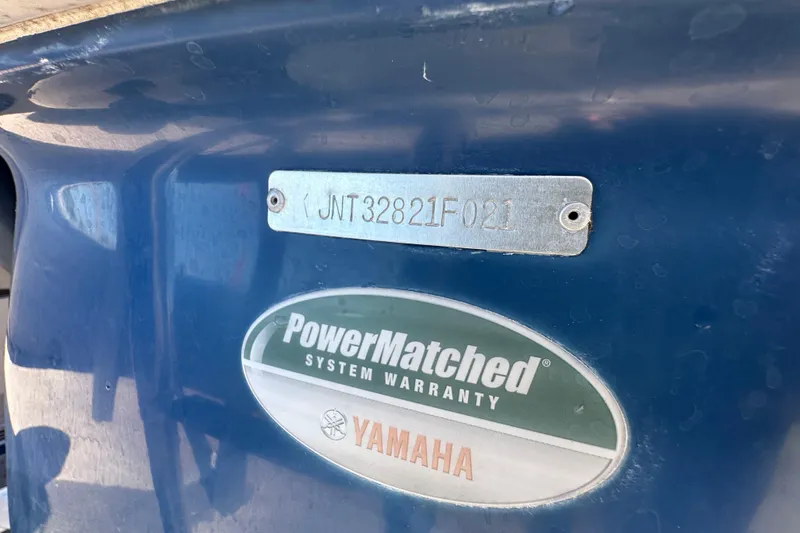 Slide: The Image of 2021 NauticStar 203 DC boat with Yamaha PowerMatched system warranty label. - 91