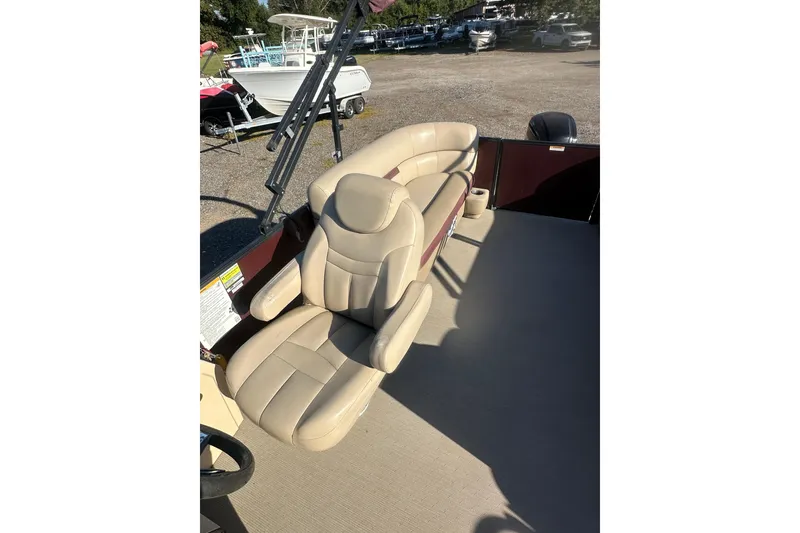 Slide: The Image of 2020 Godfrey SWEETWATER 2186 SB boat with beige seating and outdoor setting. - 10