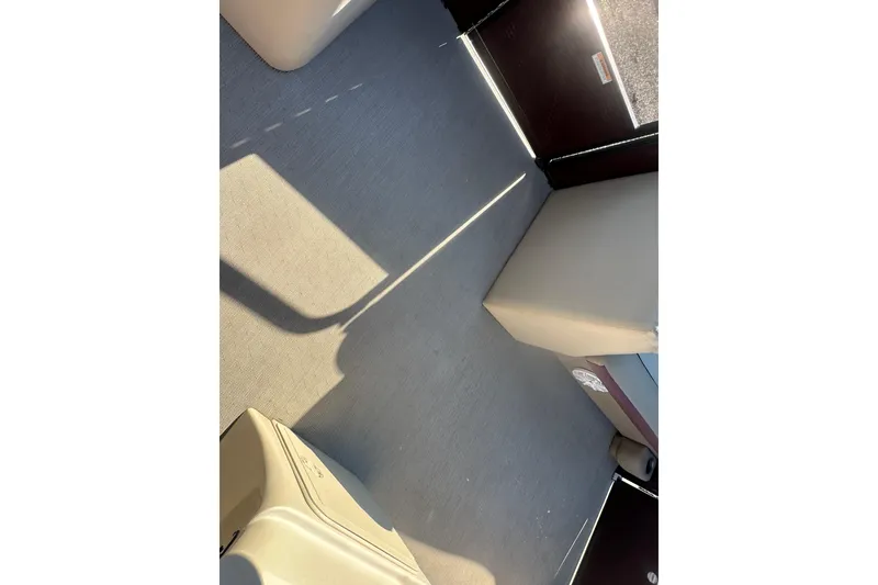 Slide: The Image of Interior view of 2020 Godfrey SWEETWATER 2186 SB pontoon boat, featuring seating and flooring. - 19