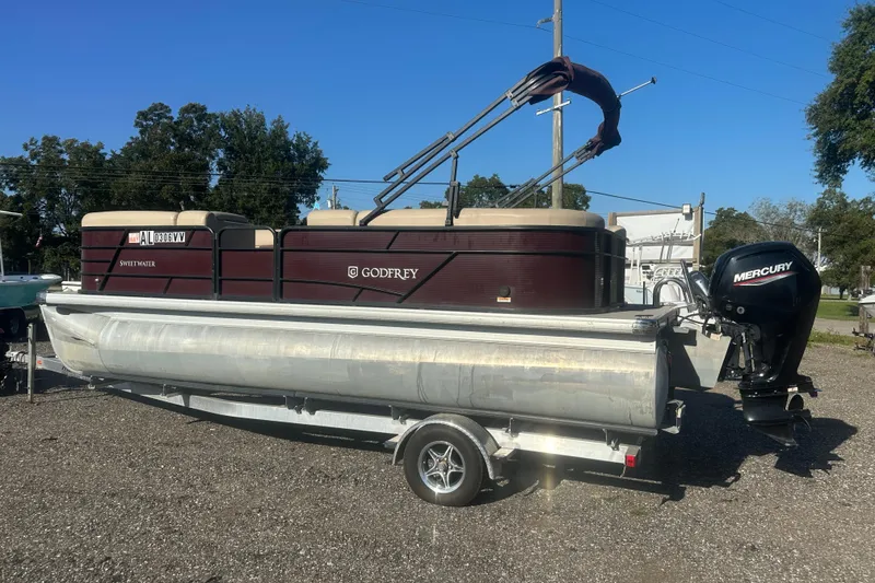Slide: The Image of 2020 Godfrey SWEETWATER 2186 SB pontoon boat with Mercury engine on trailer. - 2