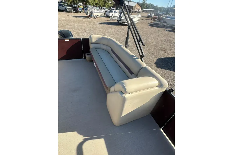 Slide: The Image of 2020 Godfrey SWEETWATER 2186 SB pontoon boat with beige seating in a sunny outdoor setting. - 9