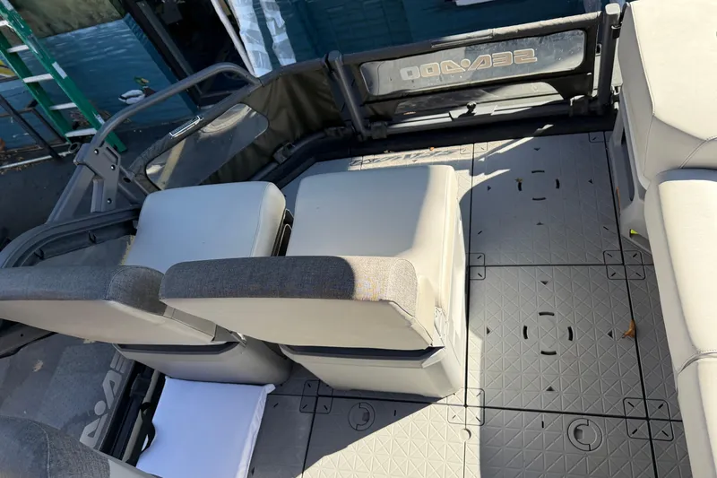 Slide: The Image of 2024 Sea-Doo Switch Cruise 21 interior with modular seating and textured flooring. - 7