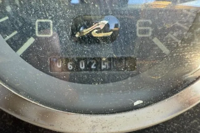 Slide: The Image of Close-up of a 1999 Sea Ray 260 Sundancer boat gauge showing 602.5 hours. - 22