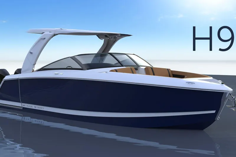 Slide: The Image of 2026 Four Winns H9 OB boat on water, sleek design, blue and white exterior. - 16