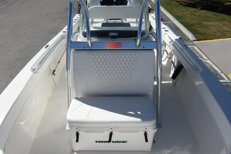 Slide: The Image of 2021 Twin Vee 260 CC GF boat interior with white seating and stainless steel rails. - 17