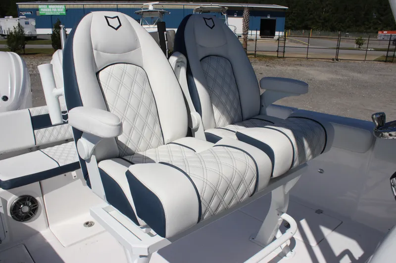 Slide: The Image of Luxurious seating on 2026 Sea Fox 268 Commander boat, featuring diamond-stitched upholstery. - 14