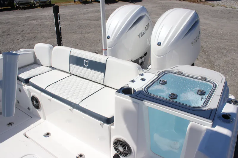 Slide: The Image of 2026 Sea Fox 268 Commander boat with dual Yamaha engines and cushioned seating. - 15