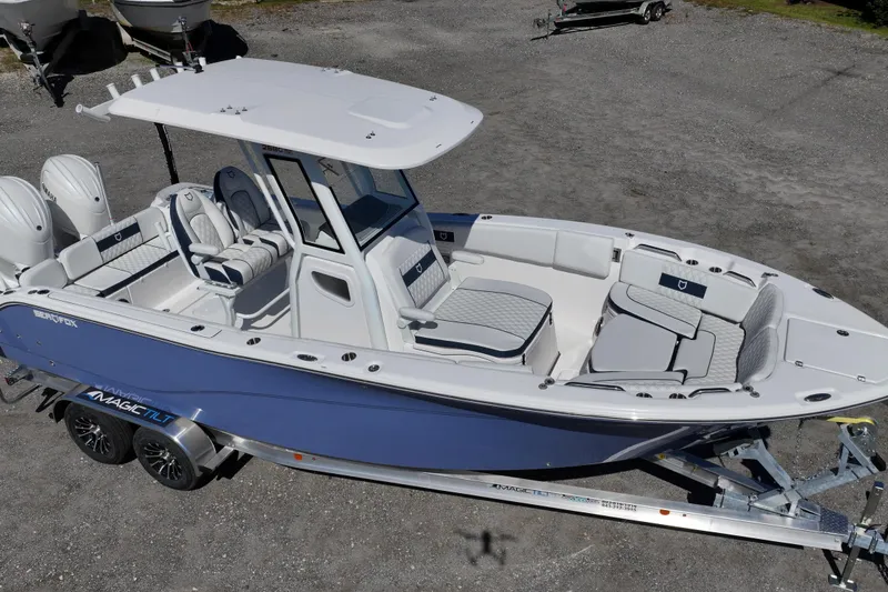Slide: The Image of 2026 Sea Fox 268 Commander boat on trailer, featuring sleek design and spacious seating. - 2