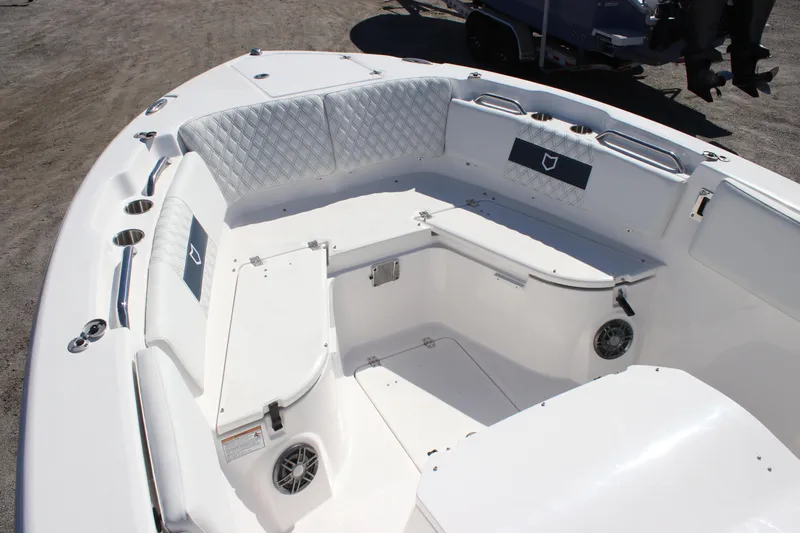 Slide: The Image of 2026 Sea Fox 268 Commander boat interior with cushioned seating and cup holders. - 6
