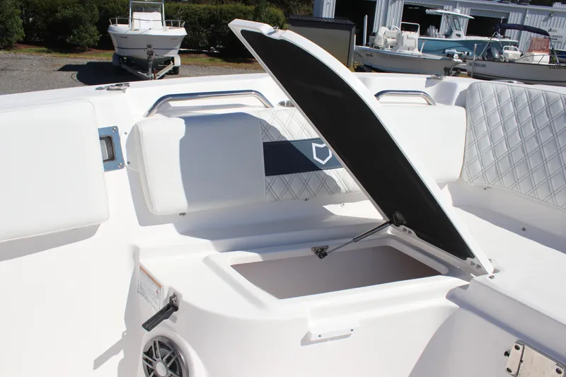 Slide: The Image of 2026 Sea Fox 268 Commander boat interior with open storage compartment. - 8