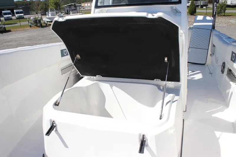 Slide: The Image of 2026 Sea Fox 268 Commander boat with open storage compartment on deck. - 9