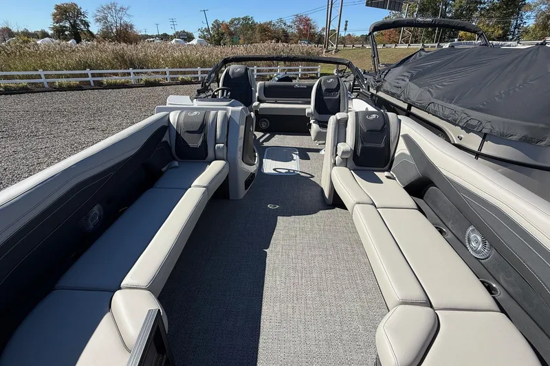 Slide: The Image of 2026 Barletta C24UC pontoon boat interior with spacious seating and modern design. - 9