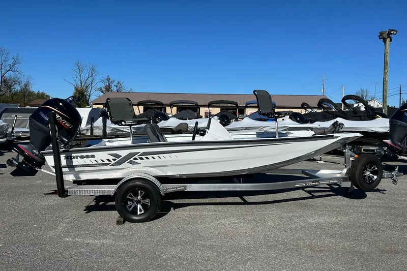 The Image of 2026 Express H18C Crappie boat with Yamaha Vmax 115 SHO engine on trailer. - 1
